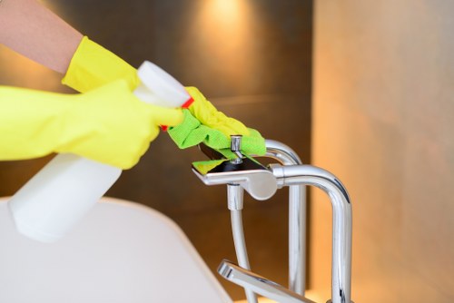 Cleaning team separating recyclable waste in Hackney