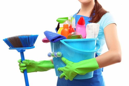 Cleaner completing a final safety check after work