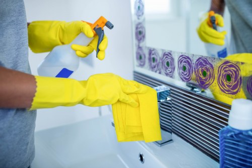 Hackney office cleaners sanitising shared workplace surfaces