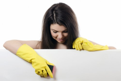 Local oven cleaner in Hackney servicing a modern home appliance